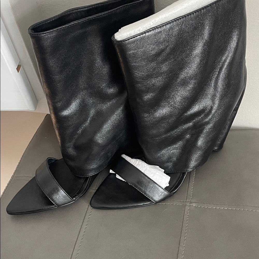 Sleek Black Leather Heeled Boots
